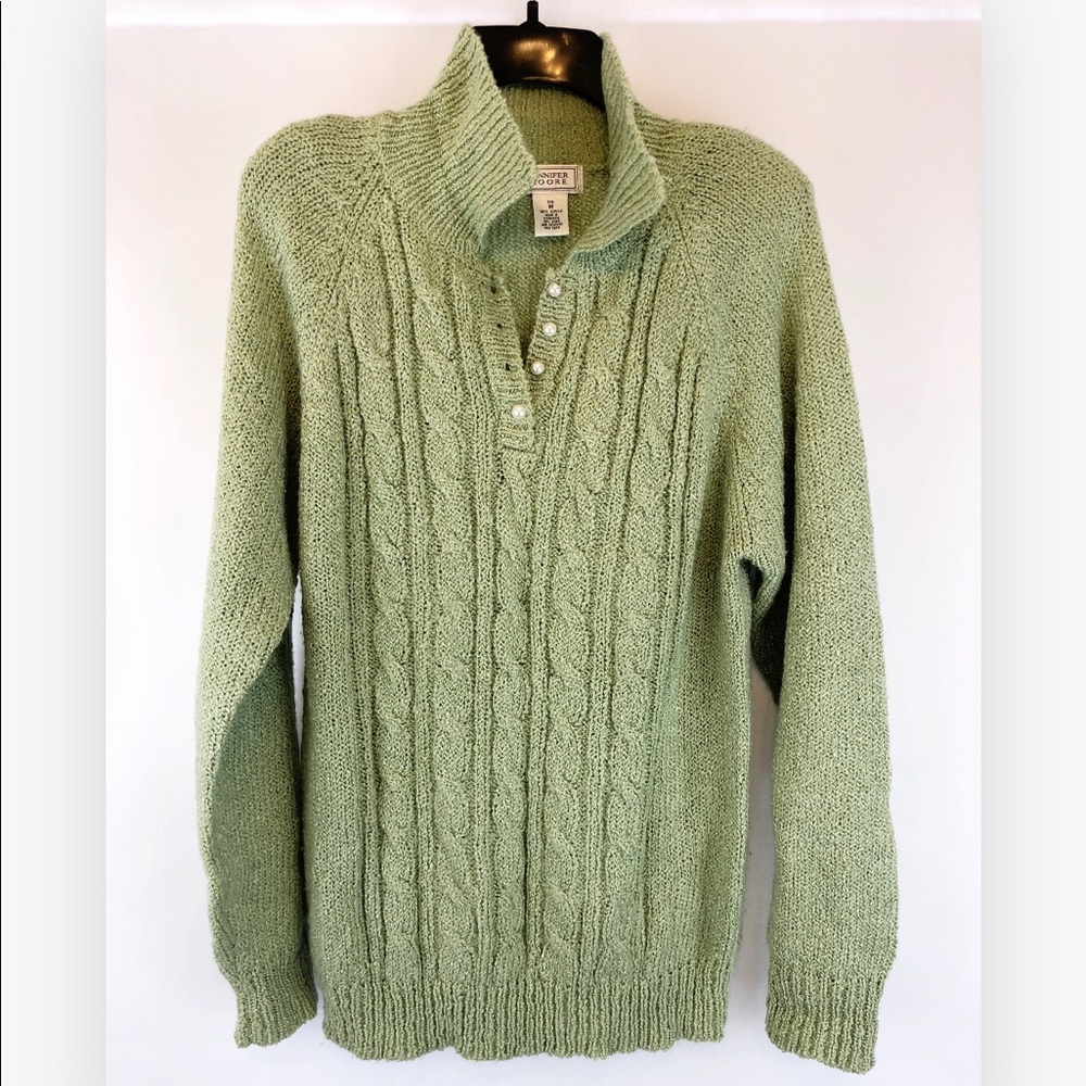 Jennifer Moore green sweater